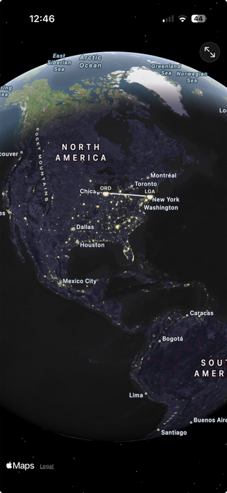Voyageur's Home screen showing a live 3D satellite map with a flight route from Chicago to New York